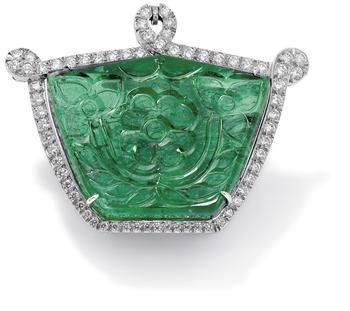 A_carved_emerald_and_diamond_brooch_pendant