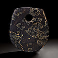 A dark blackish-grey stone axe, neolithic period, liangzhu culture, 4th-3rd millenium bc