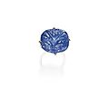 Lot 473. 18 karat white gold, carved sapphire and