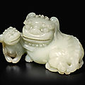 A large pale celadon jade 'lion and cub' group, qing dynasty, 19th century