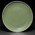 A rare very large Longquan celadon carved dish, Early Ming dynasty, early 15th century