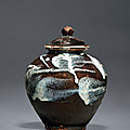 A phosphatic glaze-splashed brown-glazed ewer, tang dynasty (618-907)