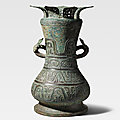 A massive archaic bronze vessel and cover, hu, spring and autumn period (770-475 bc)