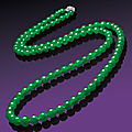 A very fine jadeite bead and diamond necklace