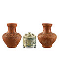 A green-glazed incense burner, boshan lu, and a pair of brown-glazed 'hunting scene' jars, eastern han dynasty