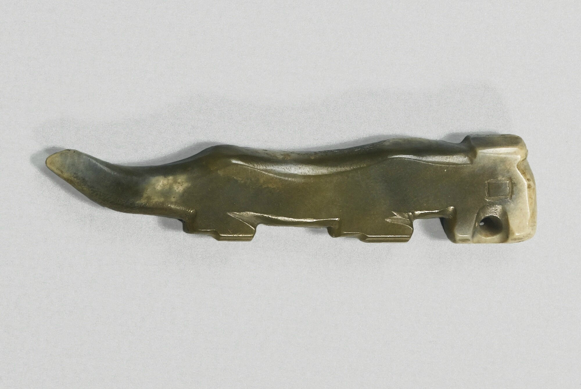 A jade tiger implrement, Shang dynasty (c