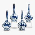 A set of four chinese blue and white porcelain bottle vases with chilong, lotus flower mark, kangxi period