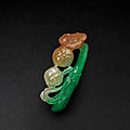 A miniature jadeite 'ruyi and persimmon' pendant