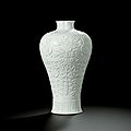 A rare white-glazed relief-carved vase, meiping, qing dynasty, qianlong period (1736-1795)