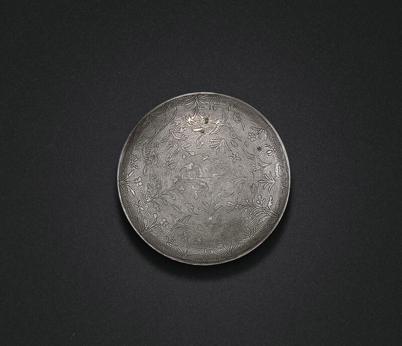 A small silver circular 'bird and flower' box and cover, Tang dynasty (618-907)