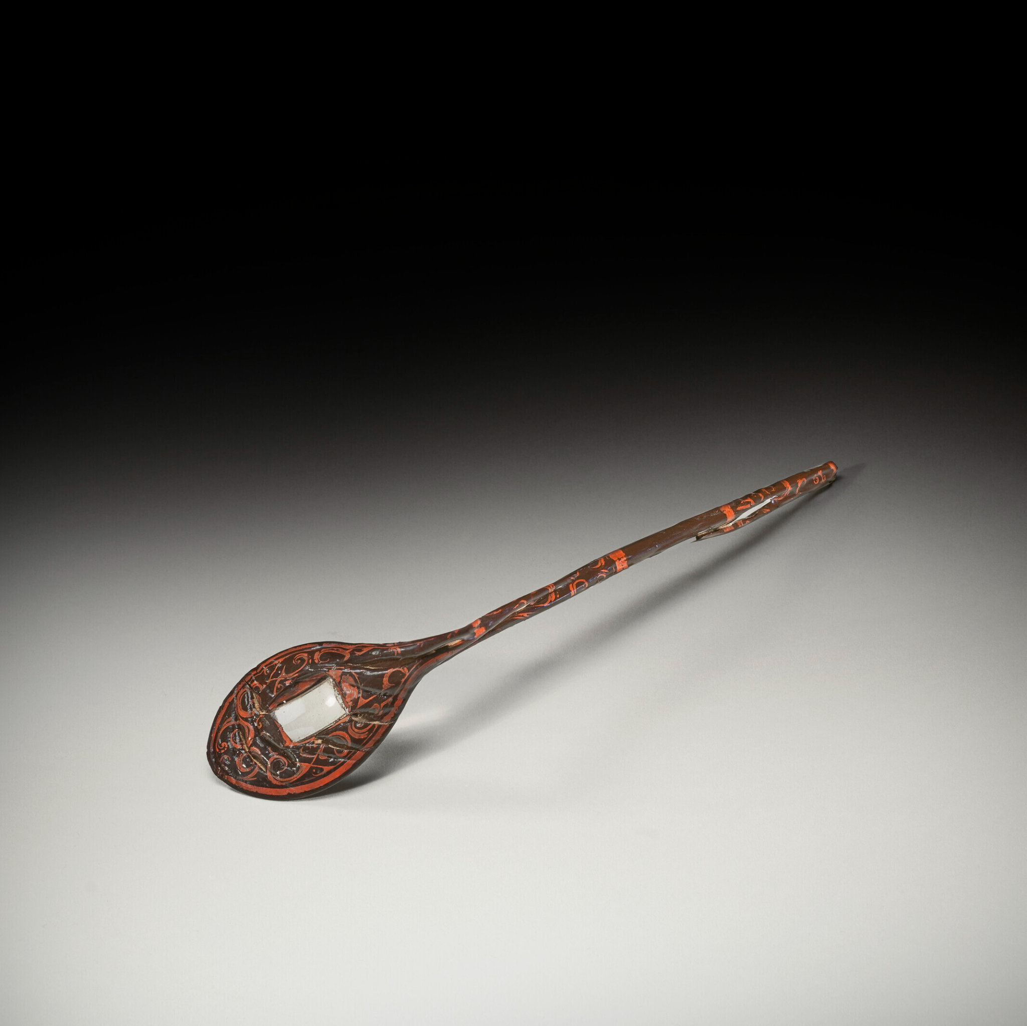 A rare crystal-inlaid red and black lacquered ritual spoon, bi