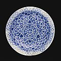A timurid blue and white pottery dish with geometric design, persia, 15th century