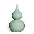 A rare celadon-glazed double-gourd vase and cover, seal mark and period of qianlong