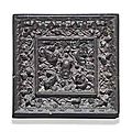 A small bronze square 'lion and grapevine' mirror. tang dynasty (618-907)