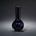 A purplish glass faceted vase. Incised Qianlong four-character mark and of the period © 2002-2010 Bonhams 1793 Ltd