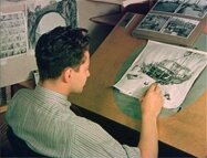 Un artiste travaille sur le layout d'un décor