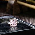 A 5.03 carats internally flawless clarity fancy light pink diamond and diamond ring