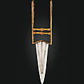 An emerald-inlaid and gem set gold push-dagger (katar), india, 18th century