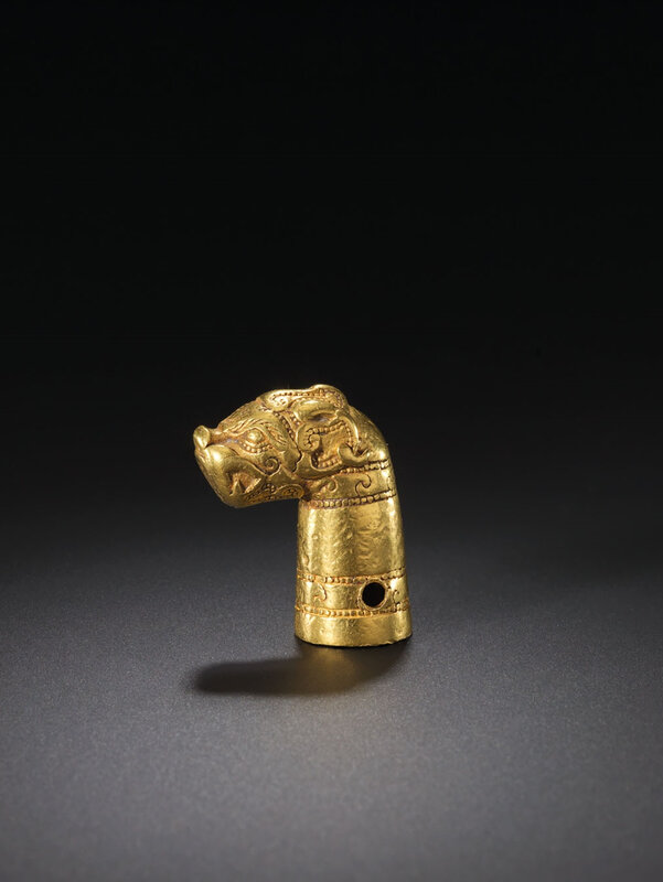 2020_CKS_18883_0011_000(a_rare_and_important_gold_feline-head_finial_spring_and_autumn_period090544)