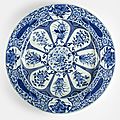 A large blue and white 'peacock and flower' plate from the collection of augustus the strong (1670-1733), kangxi period