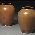 A rare pair of Yaozhou 'persimmon'-glazed jars, Northern Song dynasty, 11th-12th century