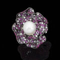 A diamond, ruby, pink sapphire and cultured pearl dress ring
