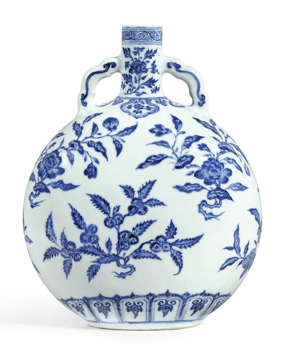 An extremely fine and rare Ming-style blue and white 'flowers and fruit' moonflask, seal mark and period of Yongzheng