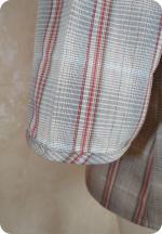 Blouse à carreaux : plis à nervure & boutonnage