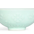 A fine celadon-glazed moulded 'floral' bowl, mark and period of yongzheng (1723-1735)
