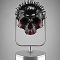 Hedi Xandt, The Longer You Last III, 2013 translucent red plastic cast of an 18th century skull with coated black nails, custom-made plastic fixture (in aluminum paint). © 2014 Hedi Xandt