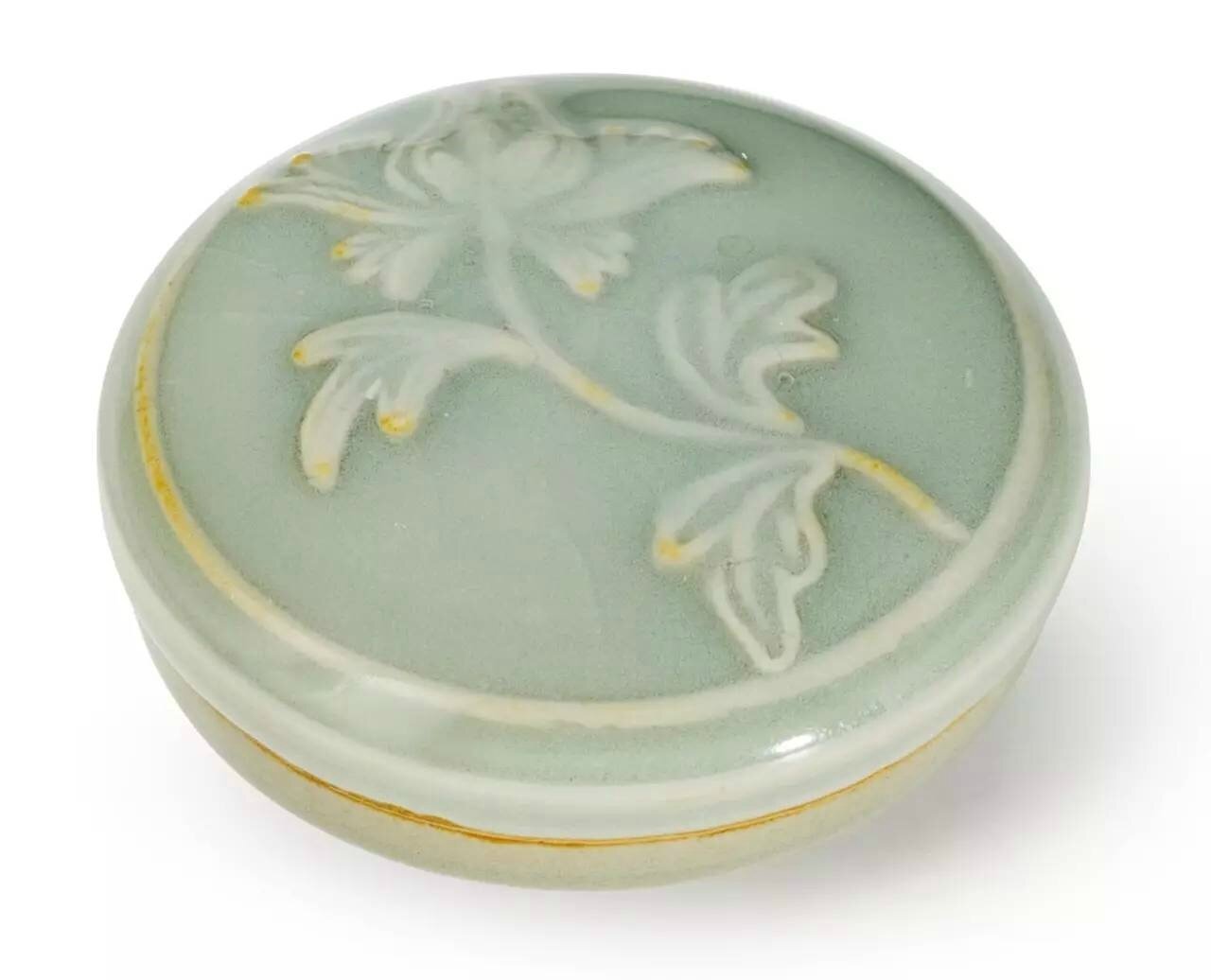 A small 'Longquan' celadon-glazed 'peony' box and cover, Yuan dynasty