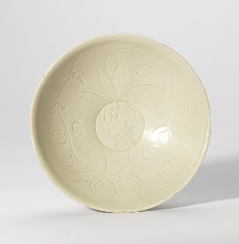 A carved 'Ding' foliate-shaped bowl, Song Dynasty (960-1279)