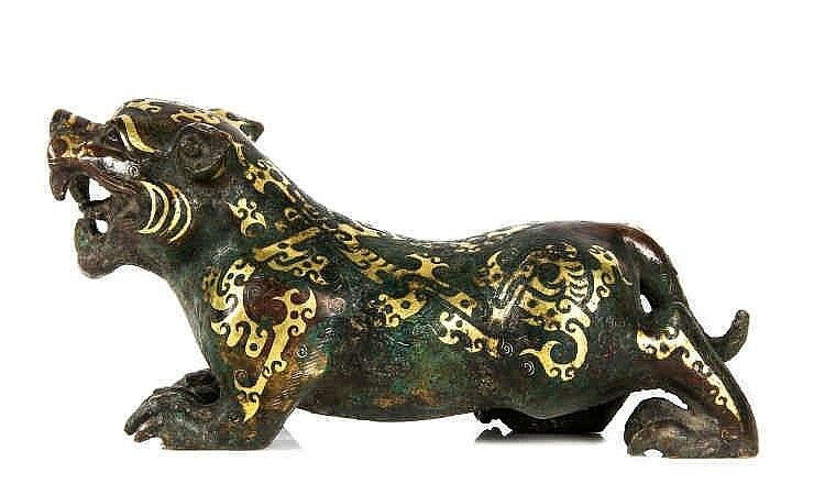 A bronze model of a tiger, Warring States-Western Han style