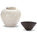 A white-glazed jar and a 'jian' 'hare's fur' teabowl, Tang dynasty and Song dynasty