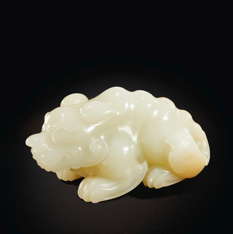 2021_NYR_19150_0646_001(a_finely_carved_white_jade_figure_of_a_mythical_beast_17th-18th_centur011925)