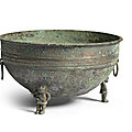 A rare large archaic bronze tripod basin, han dynasty