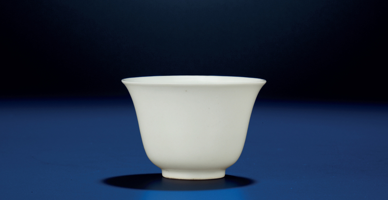 A fine and very rare early Ming white-glazed wine cup, Xuande six-character mark and of the period (1426-1435)