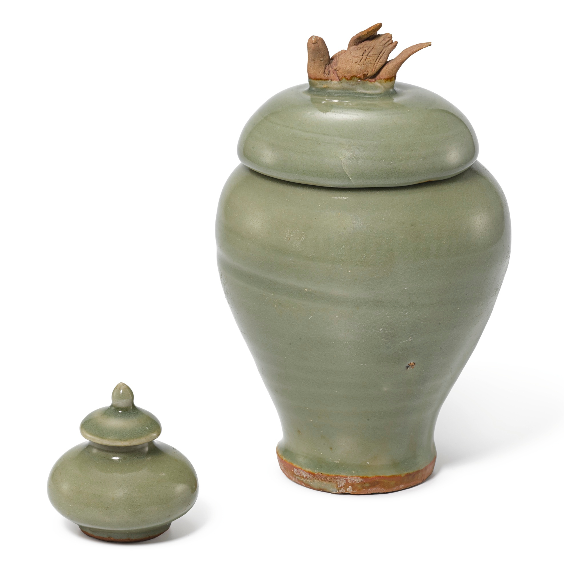 A Longquan celadon jar and cover, Yuan dynasty and a miniature Longquan celadon jar and cover, Ming dynasty, 15th century