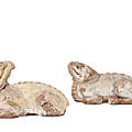 A pair of painted baked mud figures of mythical beasts, Yuan-Ming dynasty (1279-1644)