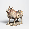 A painted pottery model of a caparisoned ox, eastern wei dynasty (534-550)