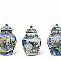 Two wucai 'figural' baluster jars and covers and a wucai 'elephant' baluster jar and cover, transitional period