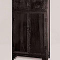 A large carved zitan cabinet, mid qing dynasty