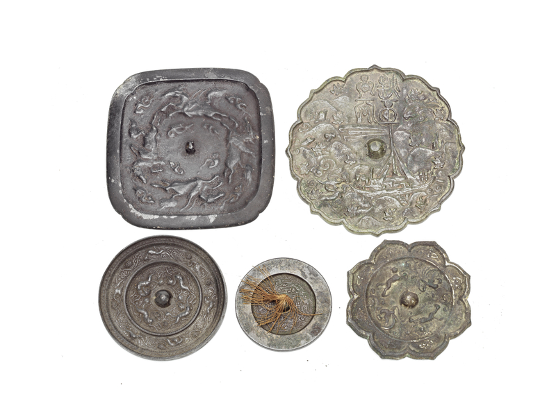 A group of five bronze mirrors Probably Han Dynasty and later