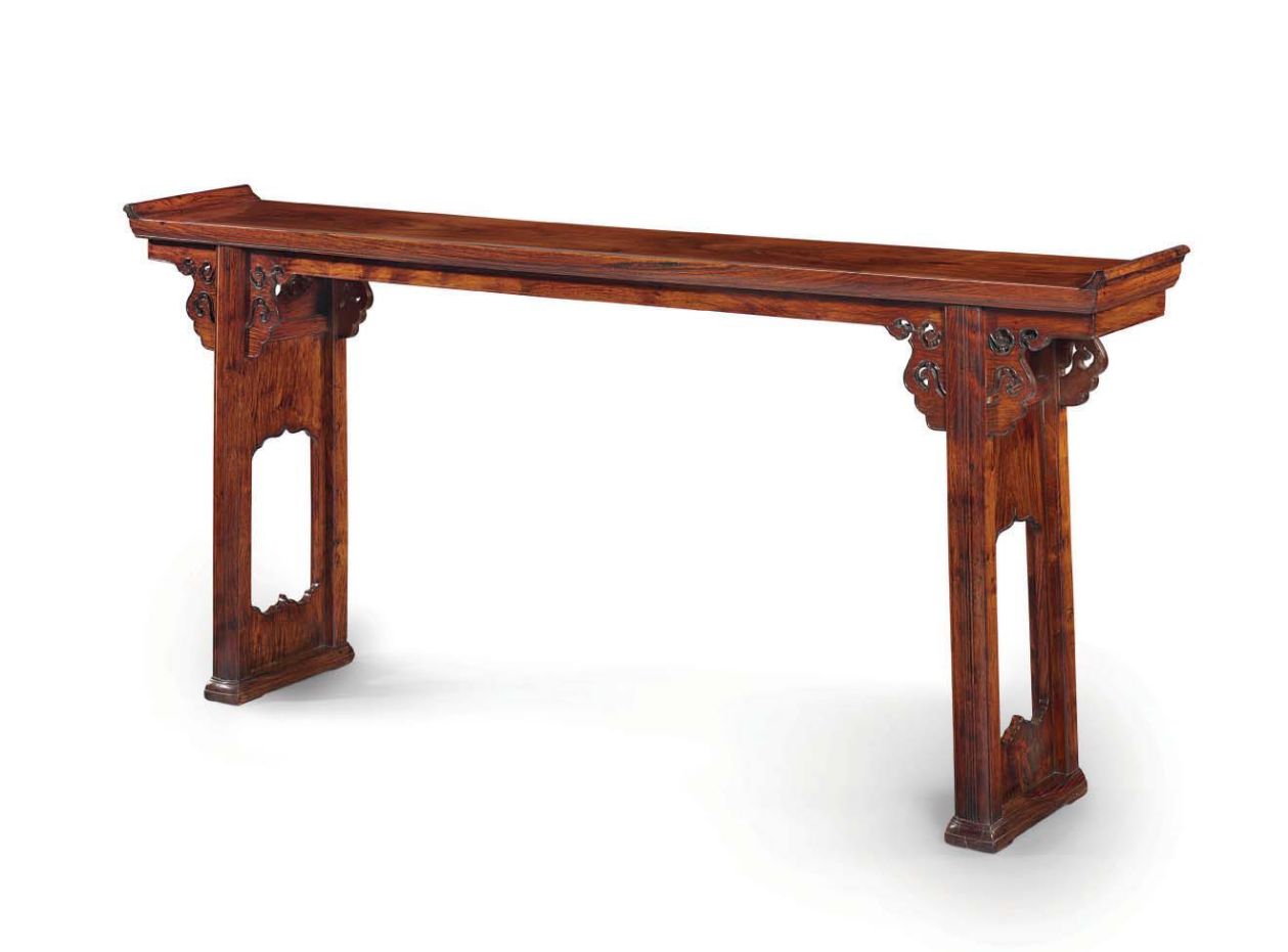 A very rare huanghuali recessed-leg demountable trestle-leg table ...