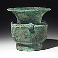 A large bronze ritual wine vessel, zun, late shang dynasty, 12th-11th century bc
