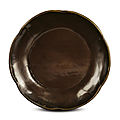 A rare brown lacquer prunus-shaped dish, song dynasty (960-1279)