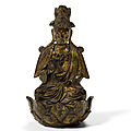 A gilt copper alloy seated buddhist figure, liao dynasty (907-1125)