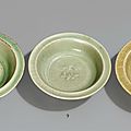 Three Longquan celadon twin fish dishes, 12th-13th century & 13th-14th century