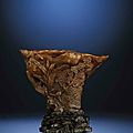 A finely carved 'Pavilion' rhinoceros horn libation cup, Ming dynasty, early 17th century 