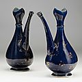 A pair of porcelain blue ewers made for the islamic market, china, 18th century